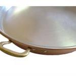 Plated copper pan in hand for fried dumplings ø 45 cm